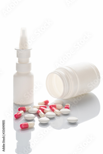 Pills on a white background. Closeup. Flu medicine. Infection treatment