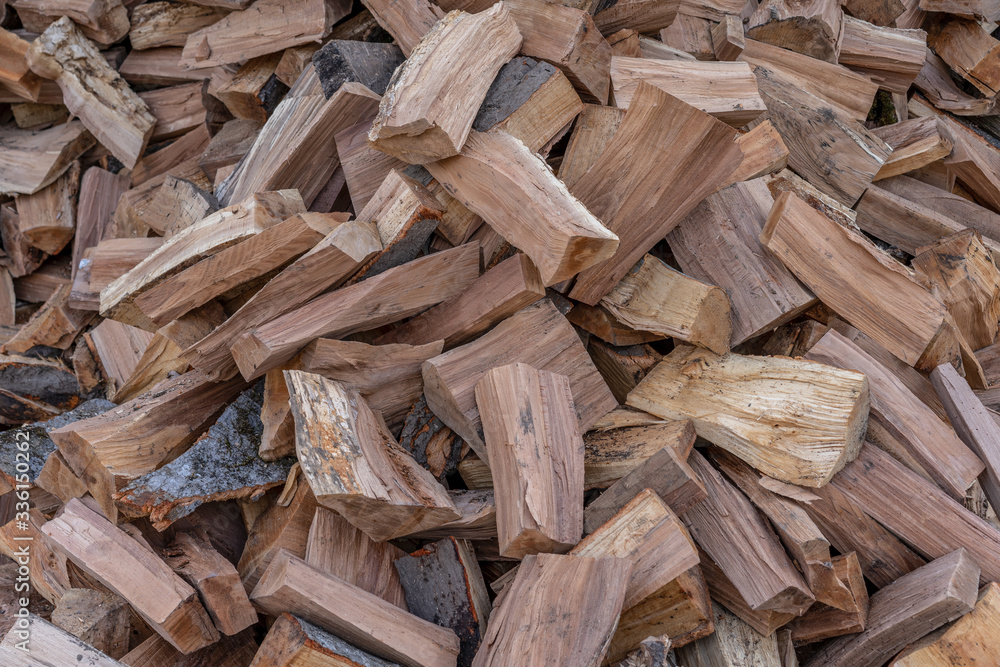 Large amount of firewood in a heap Large amount of firewood in a heap