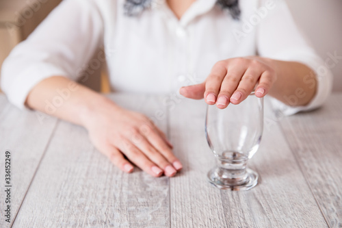 woman hand close the empty glass