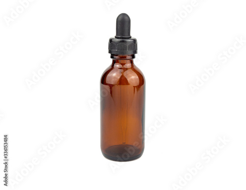 Brown medicine glass bottle with dropper isolated on white background is used for cosmetic skin care product ,containing products and medical supplies.clipping path