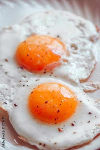 Fried eggs with salt and pepper