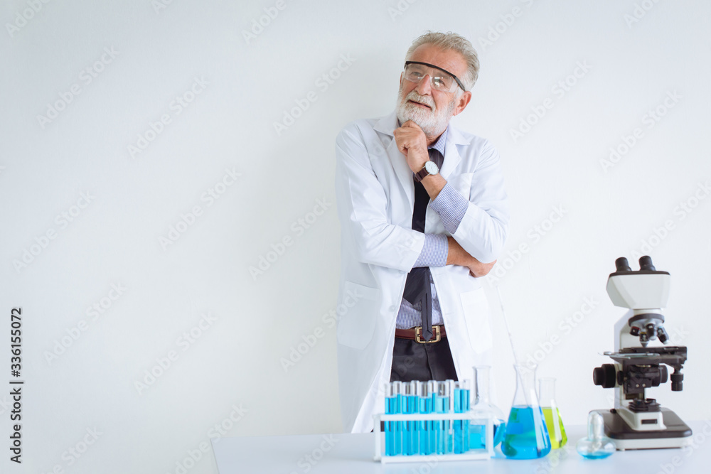 Doctor thinking in hospital science laboratory with white space for text. Doctor thinking in hospital science laboratory with white space for text.