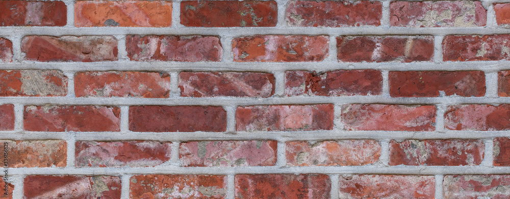 Old red brick wall pattern. Panoramic texture background. Old red brick wall pattern. Panoramic texture background.