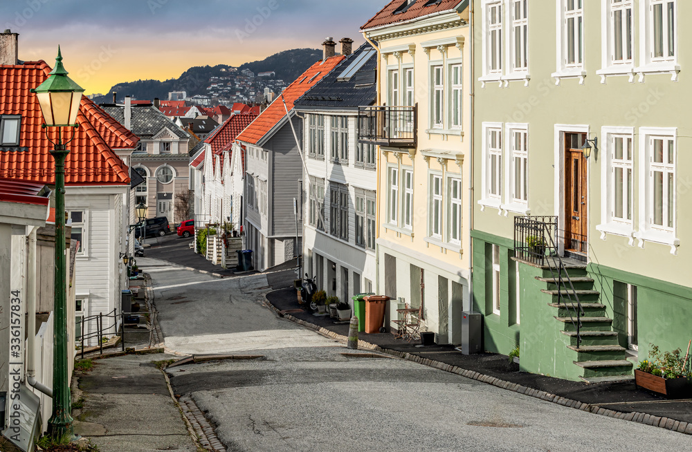 Narrow street with traditional buildings in Bergen old town, Norway.