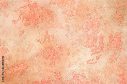 Handmade peachy texture. Crafted grunge background.