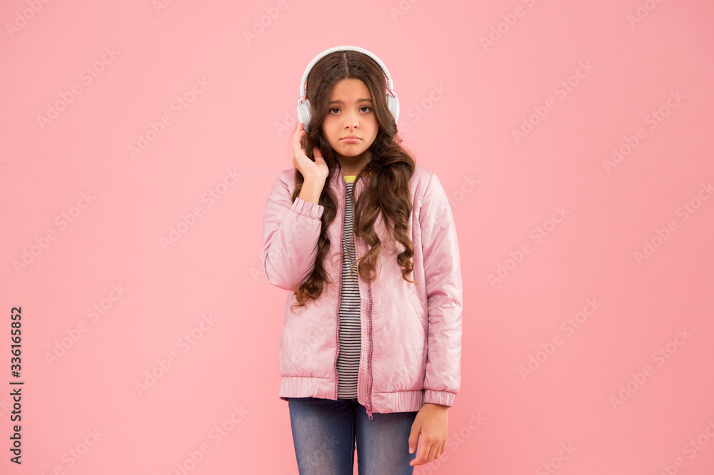 bad quality. Modern lifestyle. Music gives joy. child listen to music pink background. Little unhappy girl wear headphones playing music. New technology for kids. Fun and entertainment bad quality. Modern lifestyle. Music gives joy. child listen to music pink background. Little unhappy girl wear headphones playing music. New technology for kids. Fun and entertainment