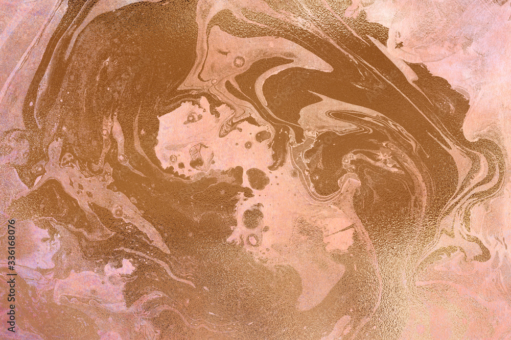 Fototapeta premium Peachy texture with gold paint leaks and stains. Craft Background.