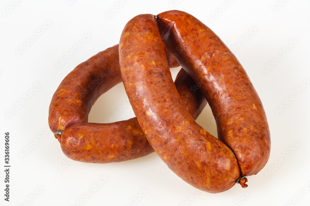 Tasty meat sausages over white background Tasty meat sausages over white background