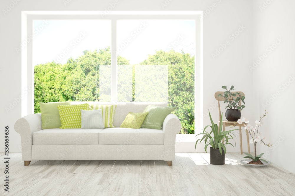 Fototapeta premium White living room with sofa and summer landscape in window. Scandinavian interior design. 3D illustration