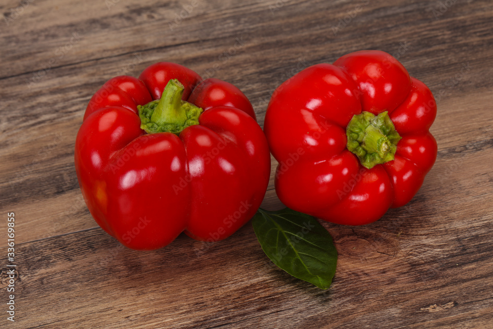 Ripe Red bell pepper over wooden Ripe Red bell pepper over wooden