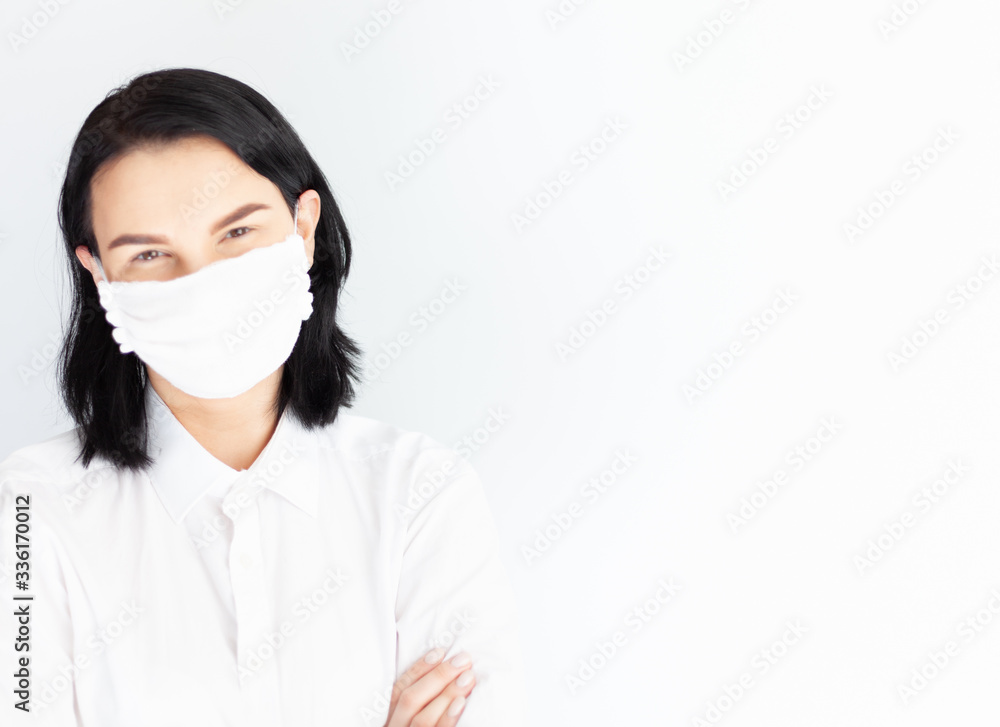 woman in medical mask on a white background woman in medical mask on a white background