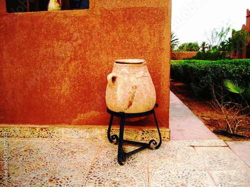 -  Decoration for gardens in the form of a jug full of water.