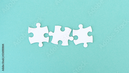 Photos Jigsaw puzzle pieces in a row for inscription, 3 pieces