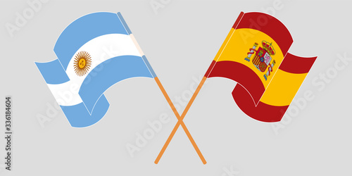 Crossed and waving flags of Argentina and Spain