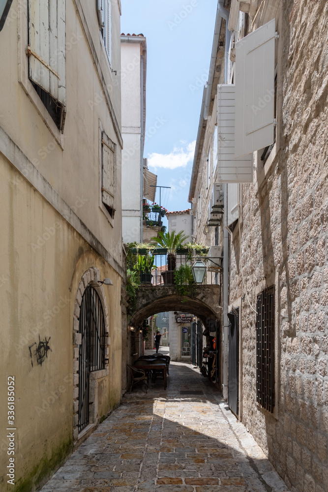 Fototapeta premium Narrow streets of the old city in Budva