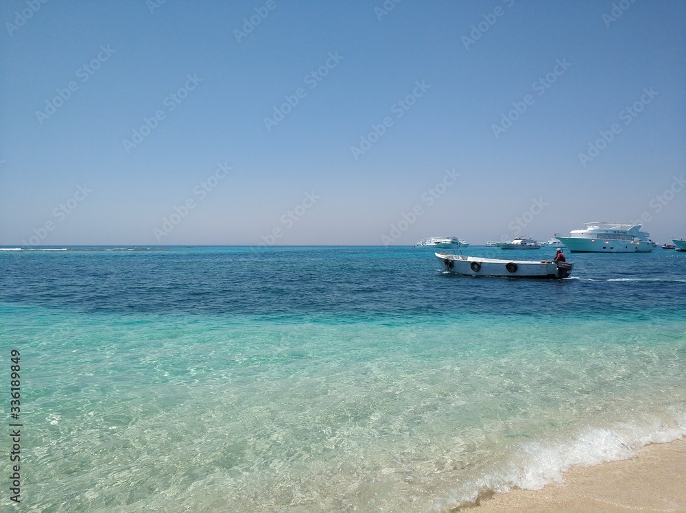 paradise island in the red sea near boat