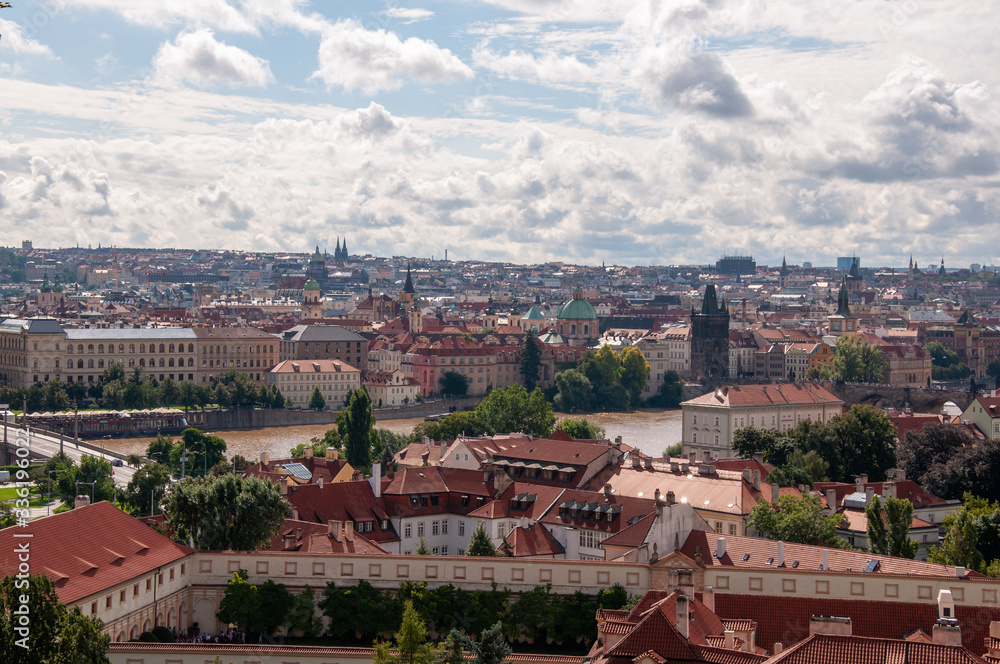 View of ancient and beautiful Prague. Vltava River and Bridge over River.