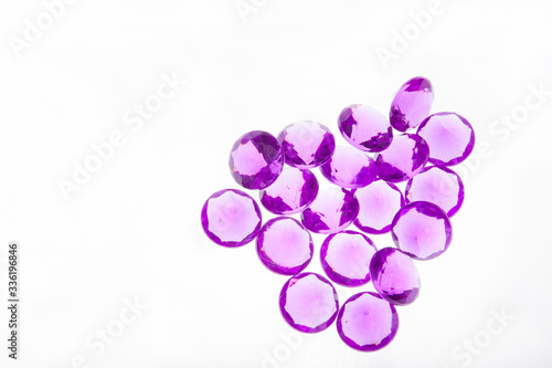 Wide angle view of purple grape shaped bead collection.