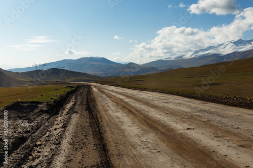 A367 highway passing in the Naryn region, Kyrgyzstan, mountain road to the Kyzart pass