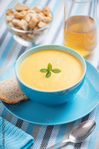 cream of pumpkin soup with bread