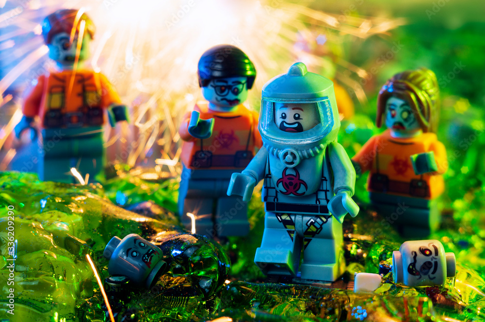 MAGNITOGORSK, RUSSIA - September, 14 2019: LEGO zombies and a very scared  person in hazmat suit. Apocalypse concept. Illustrative editorial.  Stock-Foto | Adobe Stock