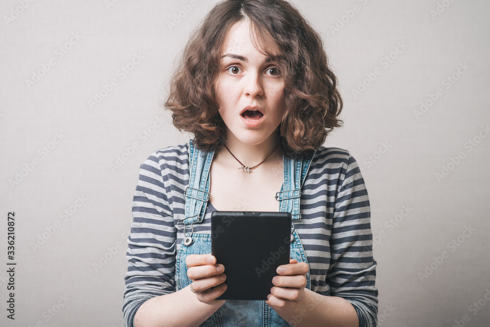 Beautiful business woman reading tablet computer. Beautiful business woman reading tablet computer.