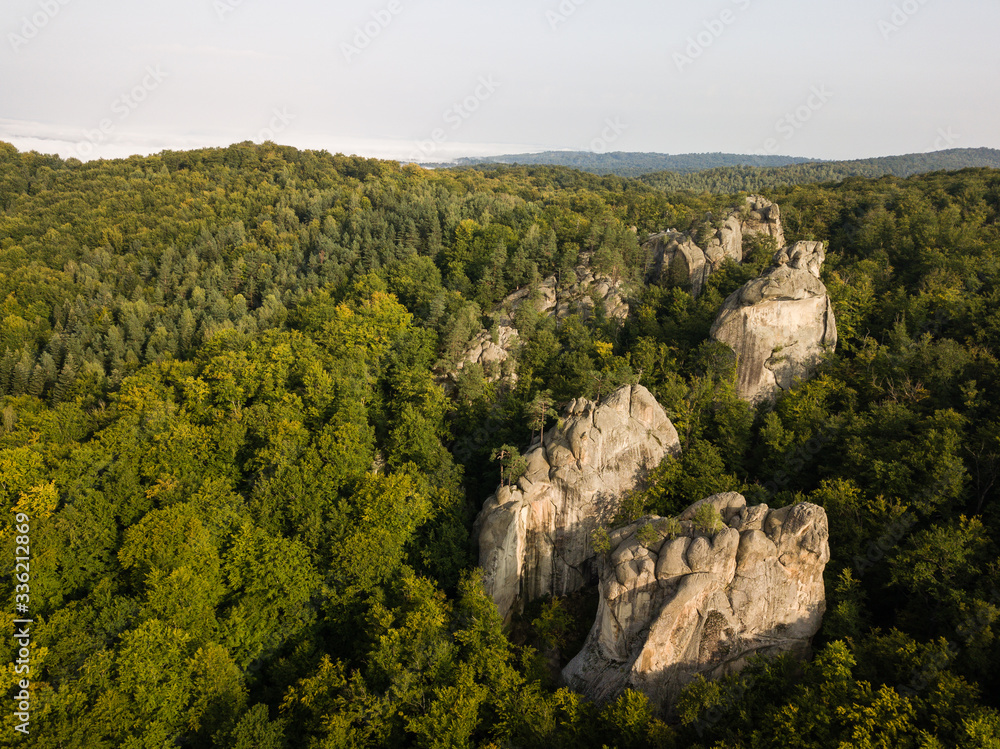 Dovbush Rocks ancient cave monastery in fantastic boulders amidst Carpathian mountains, Ukraine