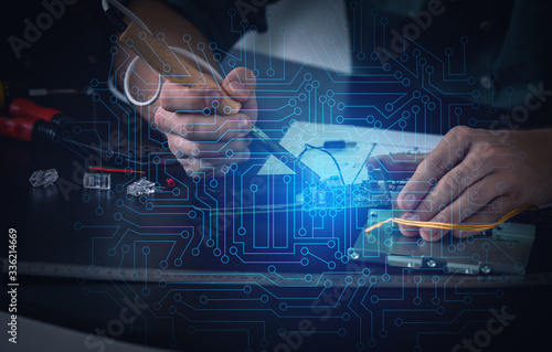 Electronic technician worki...