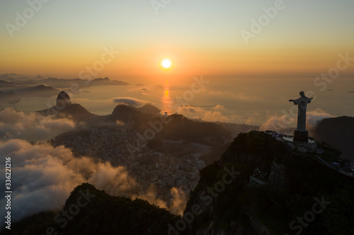 Drone view of Christ the Redeemer during the sunrise over Guanamara Bay in Rio de Janeiro