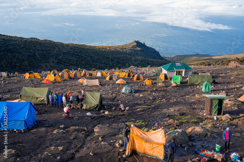 Camping on mount Kilimanjaro in tents to see the glaciers in Tanzania, Africa photo