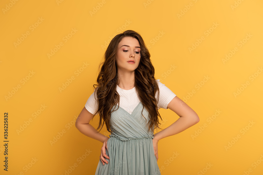 beautiful spring girl in t-shirt and dress on yellow beautiful spring girl in t-shirt and dress on yellow