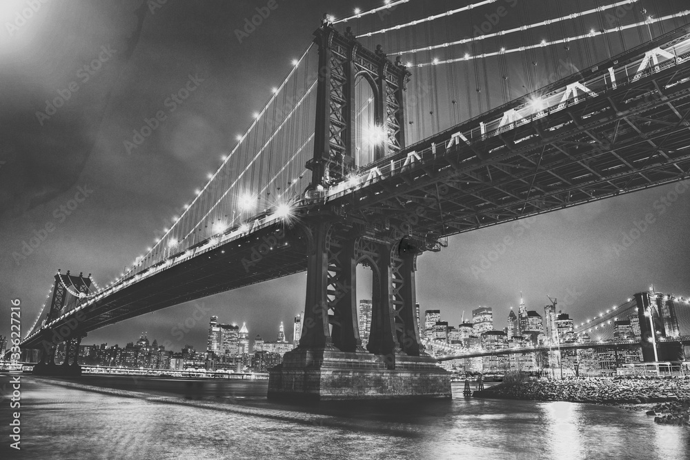 Amazing night view of Manhattan and Brooklyn Bridge at night, winter season, New York City
