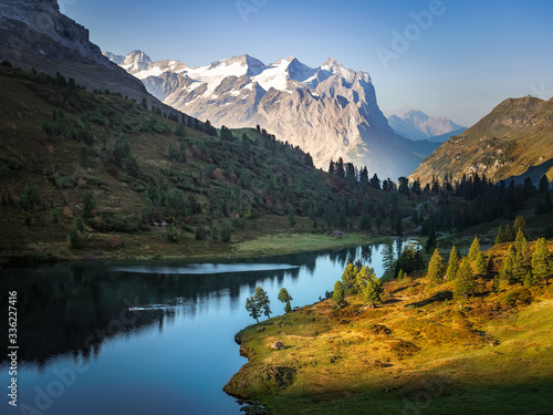 swiss alpine lake and mountains