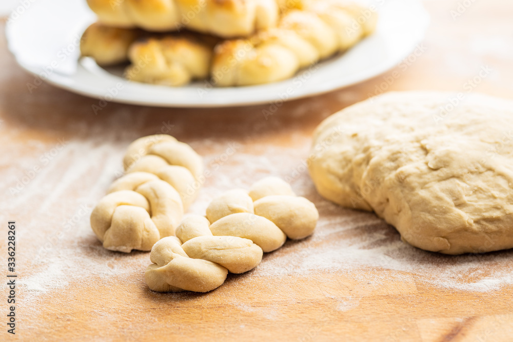Unbaked braided bun dough. Raw dough.