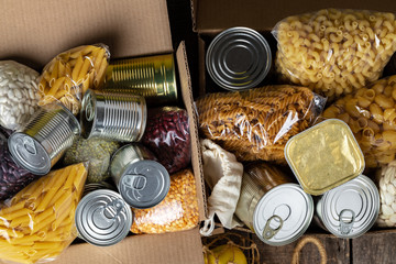 Food donations on the table. Text Donation. Close up.