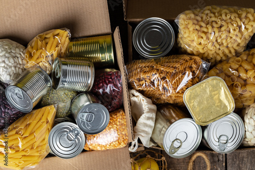 Food donations on the table. Text Donation. Close up.