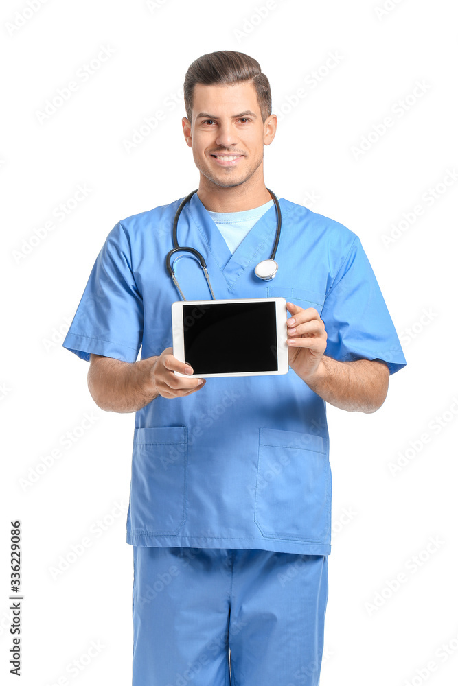 Portrait of young male doctor with tablet computer on white background Portrait of young male doctor with tablet computer on white background