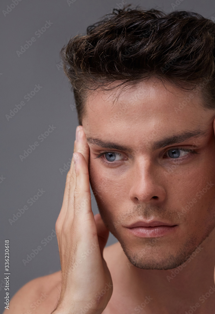 Man hydrating skin Man hydrating skin