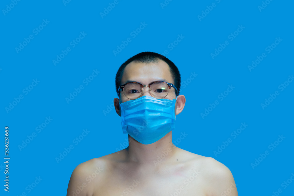 Men wearing blue background masks to protect Covid Virus.