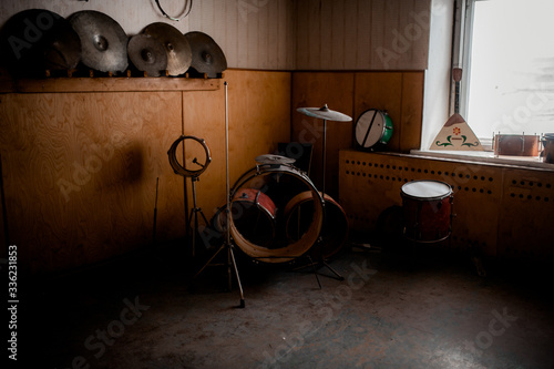 Obsolete musical room in abandoned building photo