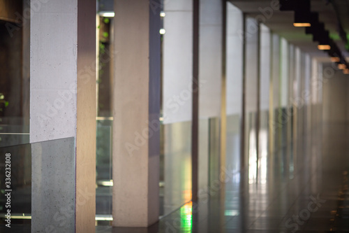Concrete wall with glass inserts as a balustrade and decorative element.