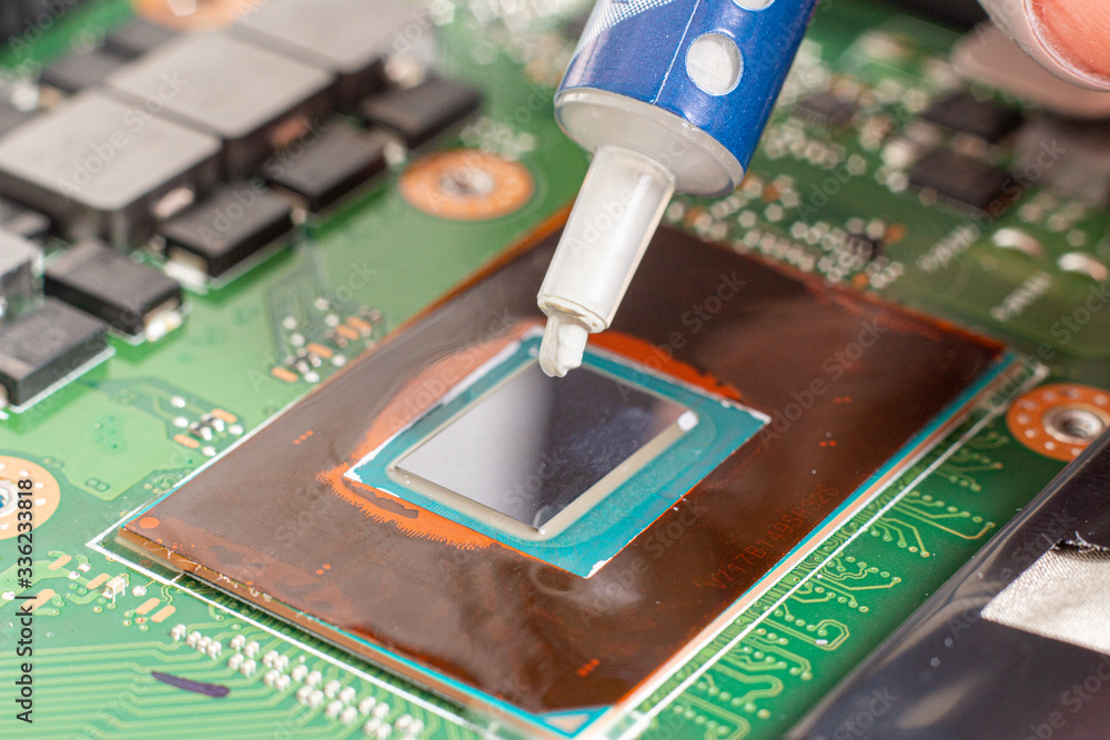 Thermal grease on a processor on a computer motherboard Stock Photo ...