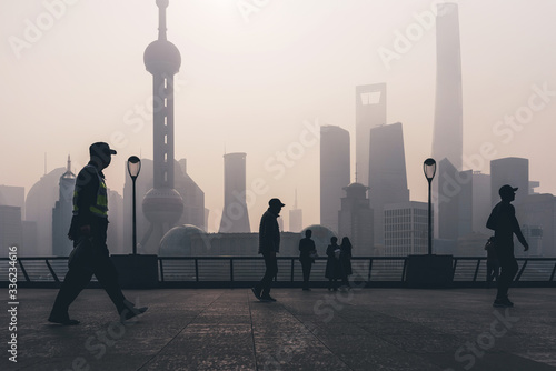People walking in The Bund, Shanghai photo