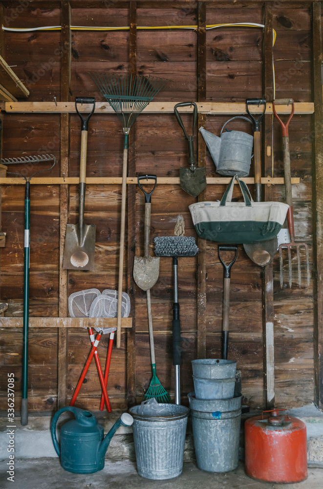 Residential Garage with Tools Hanging on Wall Residential Garage with Tools Hanging on Wall