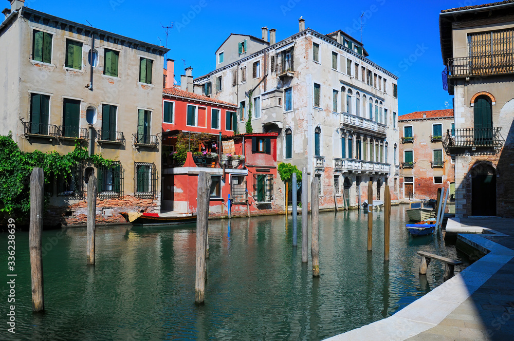 Scenic view of venetian canal with old houses, Venice, Italy