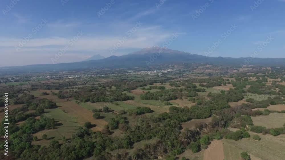 Aerial view of a mountain and trees. Aerial view of a mountain and trees.