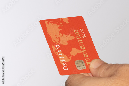 male hand with credit card on white background