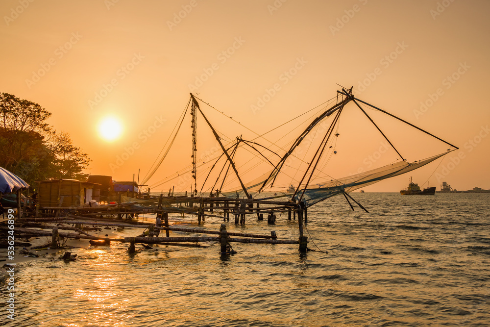 Chinese fishing net at sunrise in Cochin, Kerala, India Chinese fishing net at sunrise in Cochin, Kerala, India