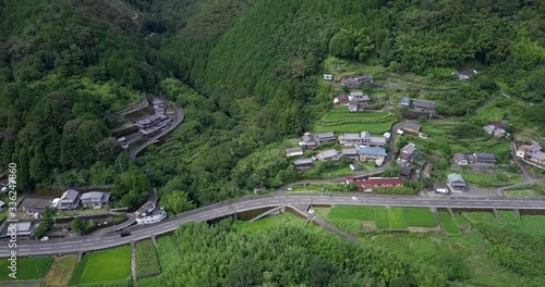 Aerial view of a village beside Iwama low water bridge. Countryside of Japan, Shikoku. photo