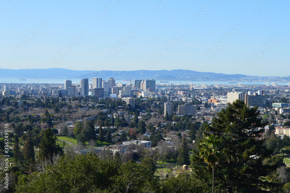View of Downtown Oakland, California with San Francisco Bay in the background.